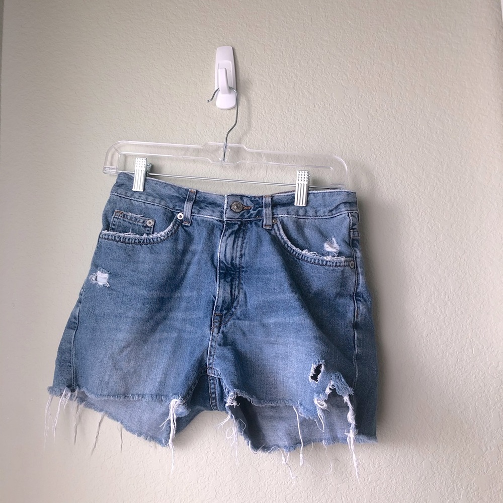 Distressed cut-off denim shorts